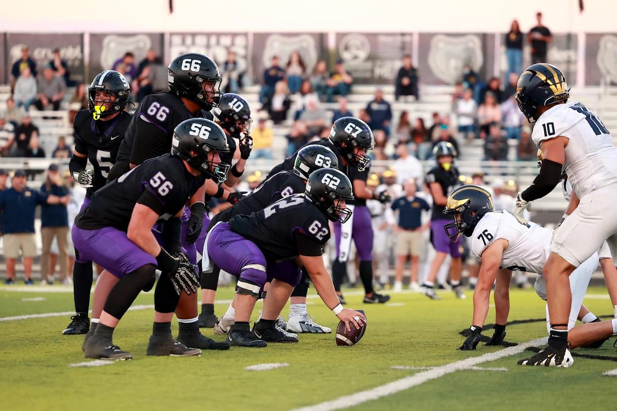 Rocky Mountain offensive line at the snap against Meridian